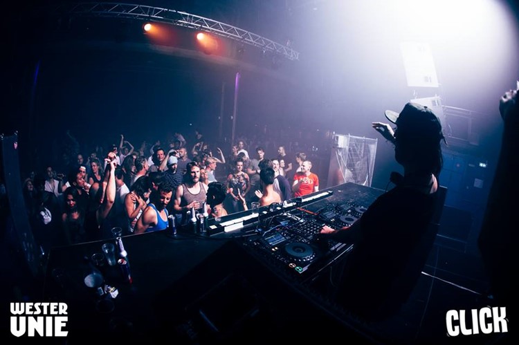 WesterUnie nightclub Amsterdam crowd with hands in the air having fun at concert show
