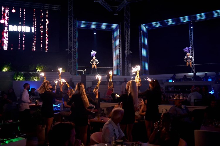 White Dubai nightclub book vip table private club bottle service champagne fun celebrate