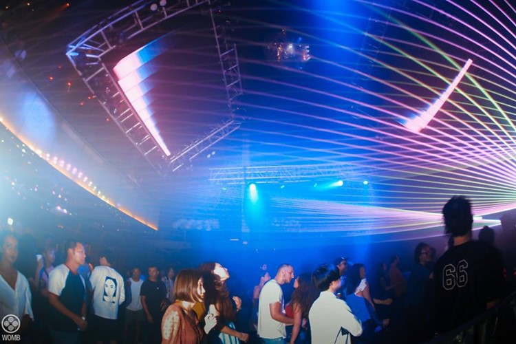 Womb nightclub Tokyo show lights colored crowd
