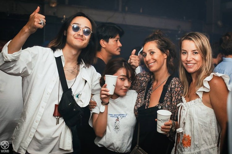 Womb nightclub Tokyo group of blonde girls and boys drinking partying