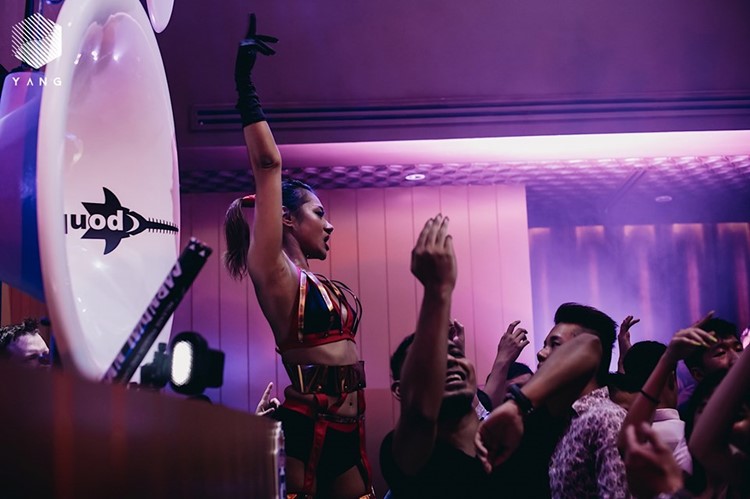 Yang nightclub Singapore exotic dancer dancing on stage show dance floor event music have fun all night go out tonight